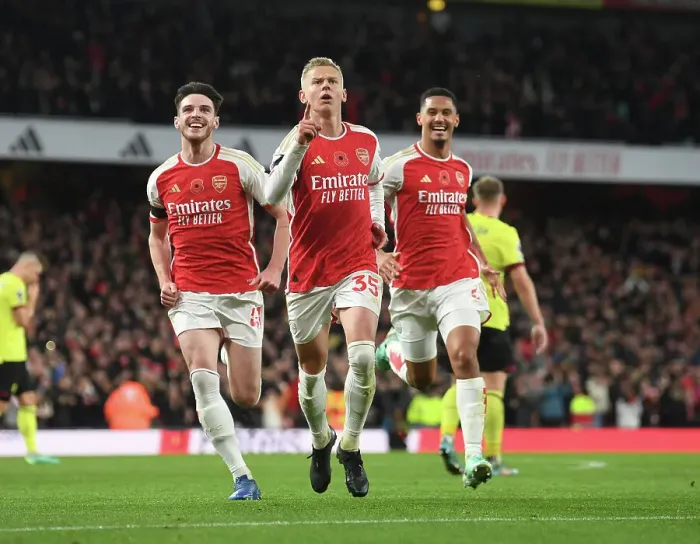 Framed Print : Arsenal's Triumph: Unforgettable Goal Celebration by Zinchenko, Rice, and Saliba (2023-24)