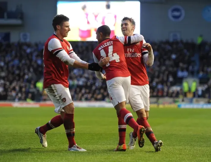 Framed Print : Arsenal's Triumph: Walcott, Giroud, and Ramsey's Goal Celebrations vs. Brighton (FA Cup 2012-13) Framed Print : Arsenal's Triumph: Walcott, Giroud, and Ramsey's Goal Celebrations vs. Brighton (FA Cup 2012-13)