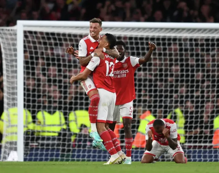 Framed Print : Arsenal's Triumph: White, Saliba, Partey Celebrate Victory over Liverpool in 2022-23 Premier League Framed Print : Arsenal's Triumph: White, Saliba, Partey Celebrate Victory over Liverpool in 2022-23 Premier League