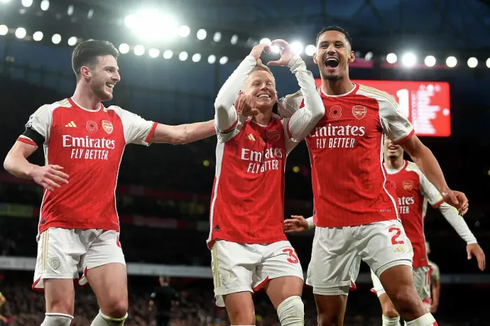 Framed Print : Arsenal's Triumph: Zinchenko, Rice, and Saliba's Euphoric Celebration after Scoring the Third Goal vs Burnley (2023-24) Framed Print : Arsenal's Triumph: Zinchenko, Rice, and Saliba's Euphoric Celebration after Scoring the Third Goal vs Burnley (2023-24)