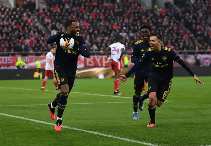Framed Print : Arsenal's Triumphant Goal Celebration: Lacazette, Ceballos, and Saka's Unity in UEFA Europa League