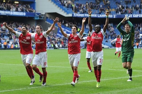 Arsenal's Triumphant Moment: Celebrating Victory Against Chelsea in the 2011-12 Premier League