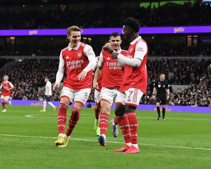 Framed Print : Arsenal's Triumphant Start to 2023: Saka, Odegaard, Xhaka Celebrate First Goals in Thrilling Tottenham Victory