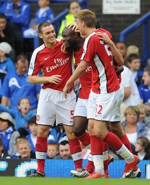 Arsenal's Triumphant Three-Goal Celebration: Gallas, Van Persie, Bendtner, and Vermaelen vs. Everton (15 / 8 / 2009)