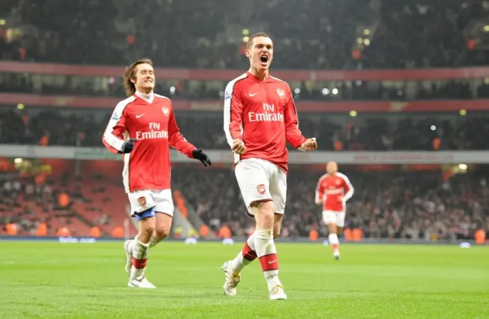 Framed Print : Arsenal's Triumphant Threesome: Vermaelen, Rosicky, and the Unforgettable Goal Against Bolton Wanderers (4:2), 2010