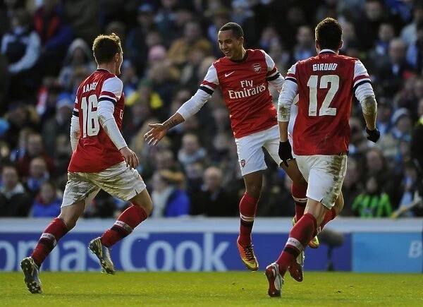 Arsenal's Triumphant Threesome: Walcott, Ramsey, and Giroud Celebrate FA Cup Goals against Brighton