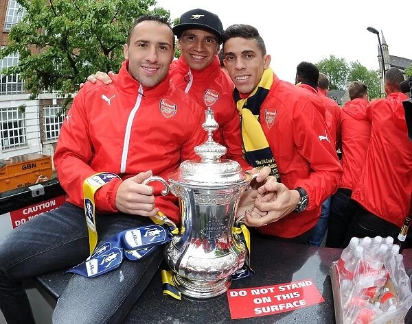 Arsenal's Triumphant Trio: Ospina, Martinez, and Gabriel Celebrate FA Cup Victory