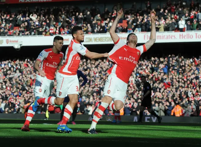 Framed Print : Arsenal's Triumphant Trio: Unforgettable Celebration After Giroud's Goal vs Everton (2014-15)