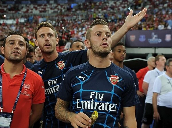 Arsenal's Triumvirate: Cazorla, Wilshere, and Monreal Align Before Arsenal v Singapore XI, 2015