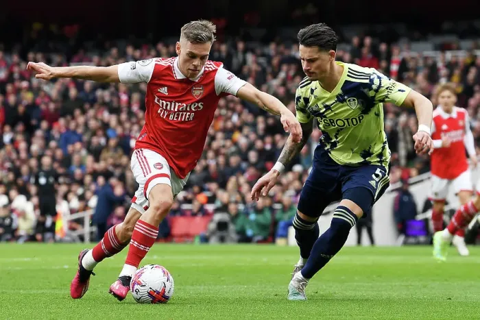 Framed Print : Arsenal's Trossard Faces Off Against Leeds Koch in Intense Premier League Clash