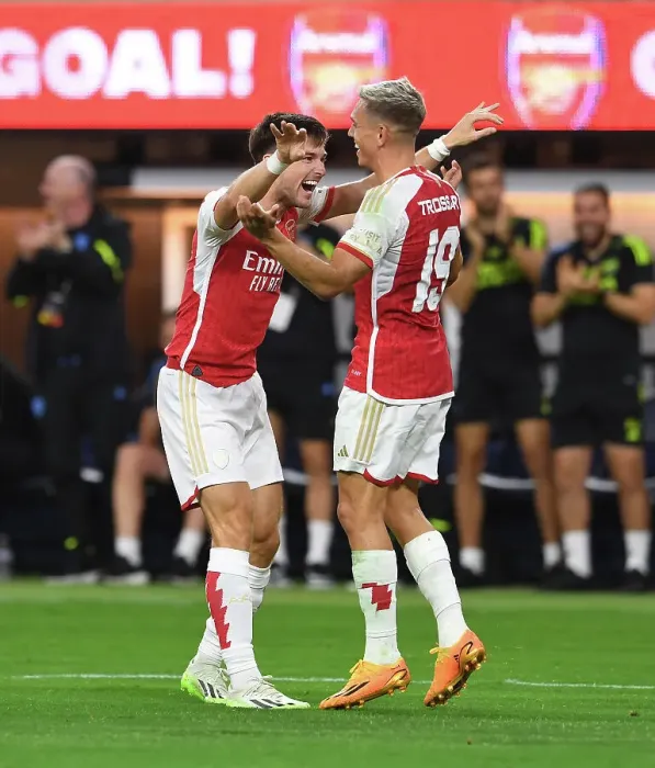 Framed Print : Arsenal's Trossard and Tierney Celebrate Goals Against FC Barcelona in 2023 Pre-Season Friendly