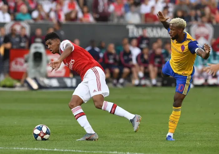Framed Print : Arsenal's Tyreece John-Jules vs. Kellyn Acosta: A Battle in the 2019 Arsenal vs. Colorado Rapids Pre-Season Clash