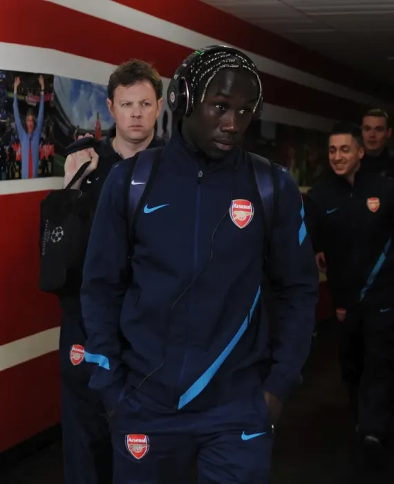 Framed Print : Arsenal's Unbeatable Defense: Bacary Sagna Shines in 3-0 UEFA Champions League Victory over AC Milan
