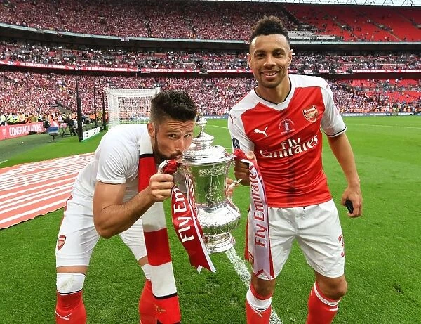 Arsenal's Unforgettable FA Cup Victory: Giroud and Coquelin's Embrace of Triumph (2017 - Arsenal vs. Chelsea)
