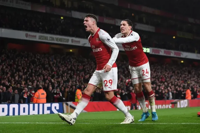 Framed Print : Arsenal's Unforgettable Goal Celebration: Xhaka and Bellerin's Euphoric Moment vs. Liverpool (2017-18)