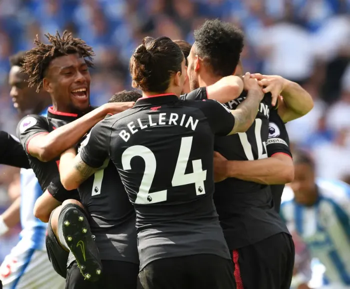 Framed Print : Arsenal's Unforgettable Moment: Aubameyang, Iwobi, and Bellerin Celebrate Goal vs. Huddersfield (2017-18)