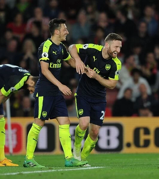Arsenal's Unforgettable Moment: Ozil and Mustafi Celebrate the Second Goal vs Southampton (2016-17)