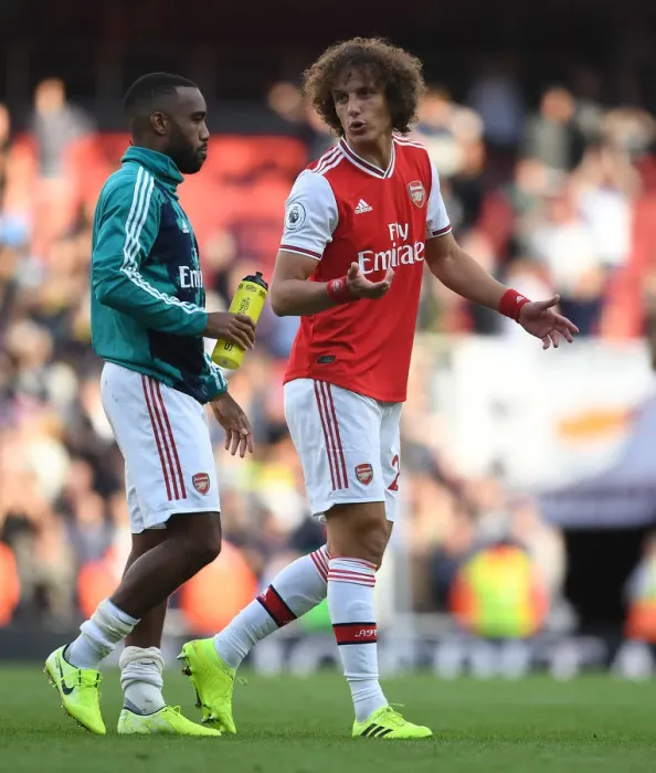 Framed Print : Arsenal's Unforgettable Victory: Lacazette and Luiz Celebrate Overcoming Tottenham (2019-20)