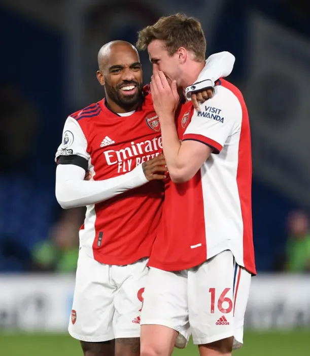 Framed Print : Arsenal's Unforgettable Win: Lacazette and Holding's Thrilling Celebration vs. Chelsea (April 2022)