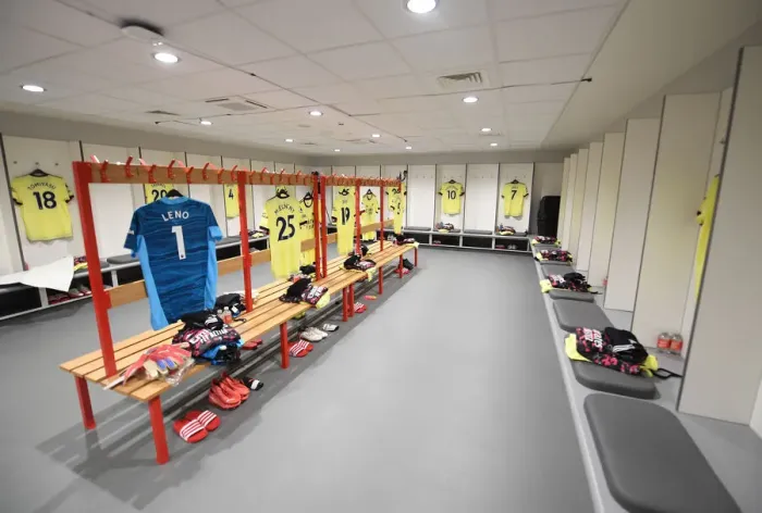 Framed Print : Arsenal's United Focus: Pre-Match Huddle at Anfield, Premier League 2021-22