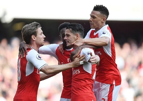 Arsenal's Unlikely Heroes: Xhaka, Gibbs, Monreal, and Welbeck Secure Victory Against Manchester United (2016-17)