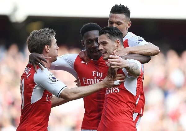 Arsenal's Unlikely Heroes: Xhaka, Gibbs, Monreal, and Welbeck Secure Victory Over Manchester United (2016-17)