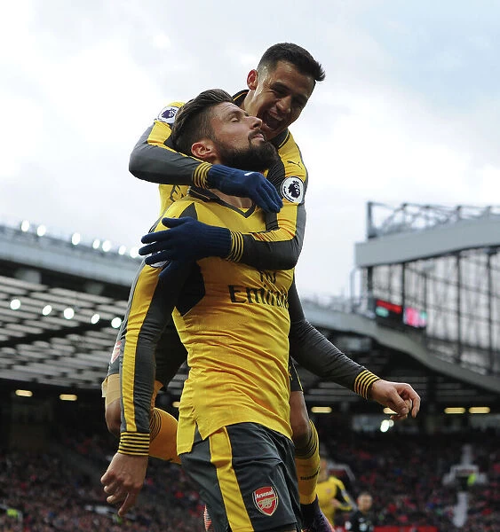 Arsenal's Unstoppable Duo: Giroud and Sanchez Celebrate Goal Against Manchester United, 2016-17