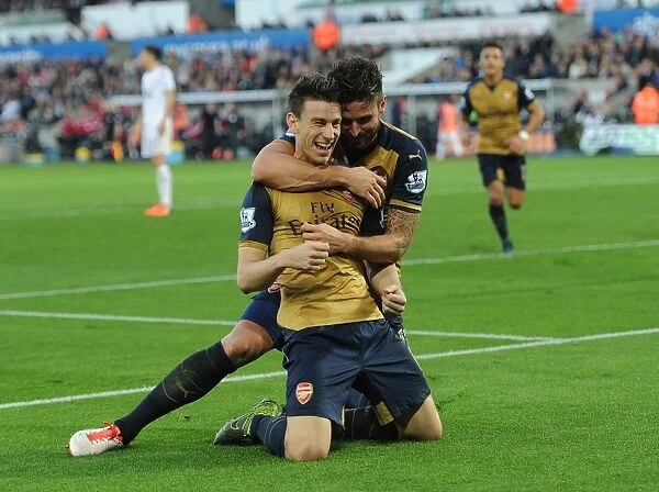 Arsenal's Unstoppable Duo: Koscielny and Giroud's Goal Celebration after Victory over Swansea City (2015-16)