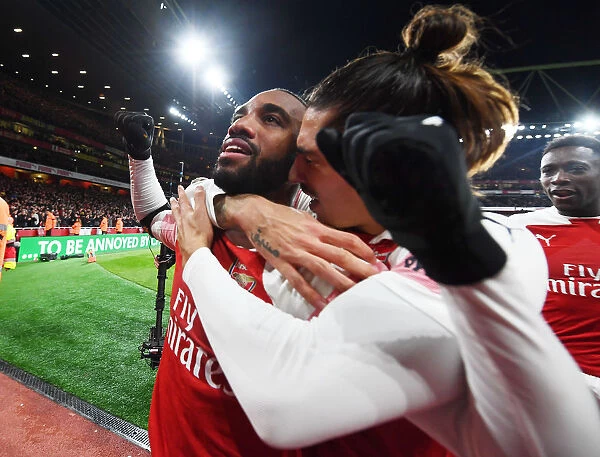 Arsenal's Unstoppable Duo: Lacazette and Bellerin Celebrate Goal Against Liverpool