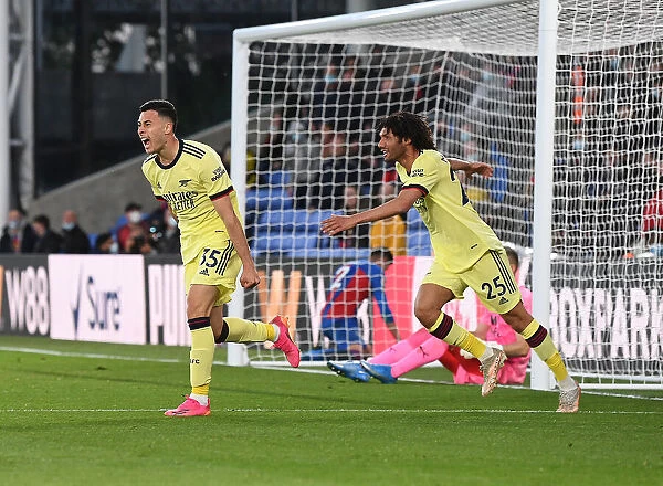 Arsenal's Unstoppable Duo: Martinelli and Elneny Celebrate Winning Goals vs. Crystal Palace (2020-21)