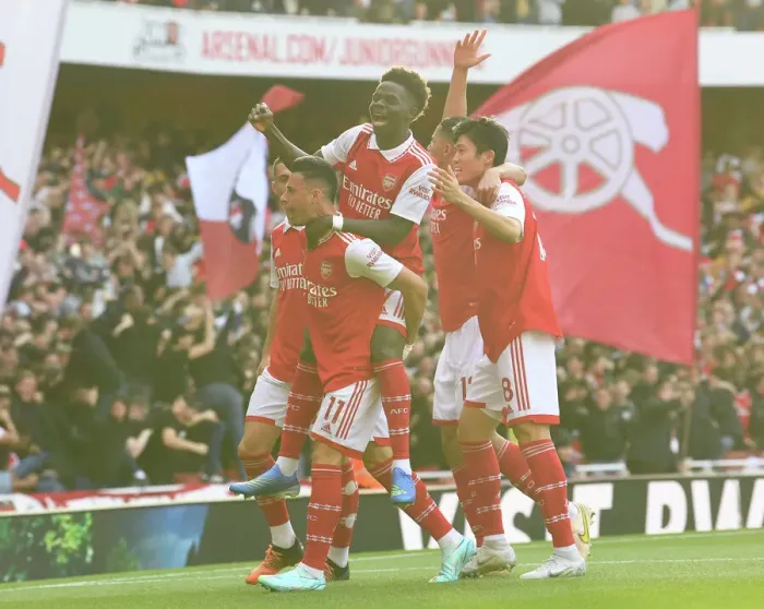Framed Print : Arsenal's Unstoppable Duo: Martinelli and Saka Score First Goals Against Liverpool (2022-23)