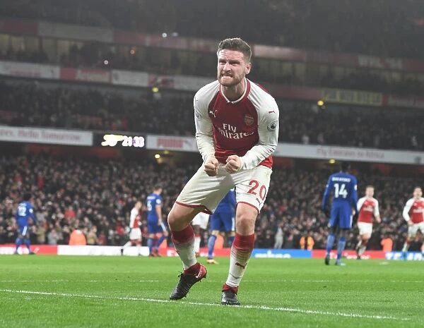 Arsenal's Unstoppable Duo: Mustafi and Bellerin in Euphoric Celebration of Their Second Goal Against Chelsea (2017-18)