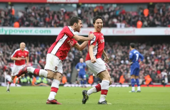 Framed Print : Arsenal's Unstoppable Duo: Nasri and Fabregas Celebrate Victory Over Manchester United Framed Print : Arsenal's Unstoppable Duo: Nasri and Fabregas Celebrate Victory Over Manchester United