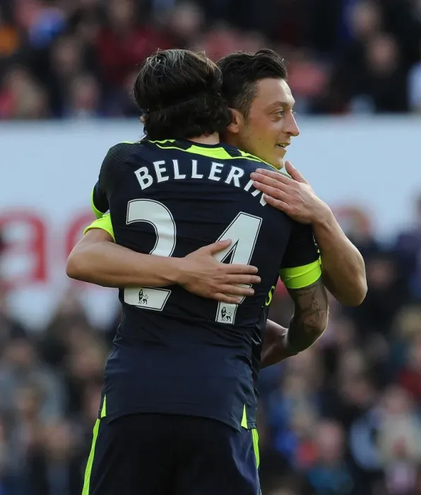 Framed Print : Arsenal's Unstoppable Duo: Ozil and Bellerin Celebrate Goal Against Stoke City