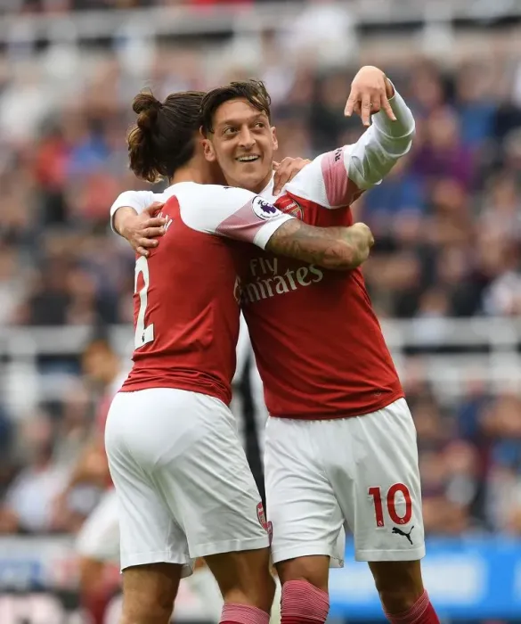 Framed Print : Arsenal's Unstoppable Duo: Ozil and Bellerin Celebrate Goal vs Newcastle United (2018-19) Framed Print : Arsenal's Unstoppable Duo: Ozil and Bellerin Celebrate Goal vs Newcastle United (2018-19)