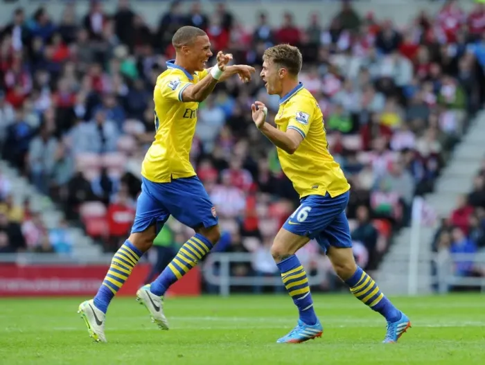 Framed Print : Arsenal's Unstoppable Duo: Ramsey and Gibbs Celebrate Goals Against Sunderland (2013-14)