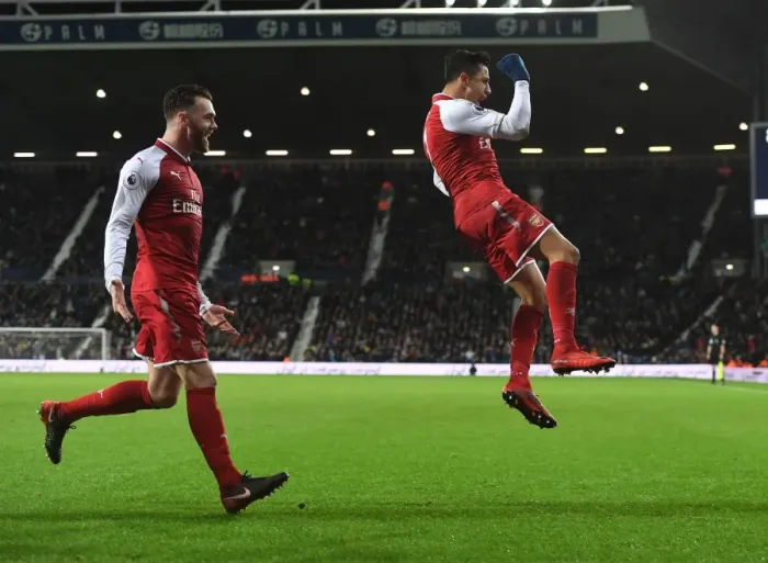 Framed Print : Arsenal's Unstoppable Duo: Sanchez and Chambers - Celebrating Glory: A Memorable Moment as Arsenal Scores Against West Bromwich Albion (2017-18) Framed Print : Arsenal's Unstoppable Duo: Sanchez and Chambers - Celebrating Glory: A Memorable Moment as Arsenal Scores Against West Bromwich Albion (2017-18)