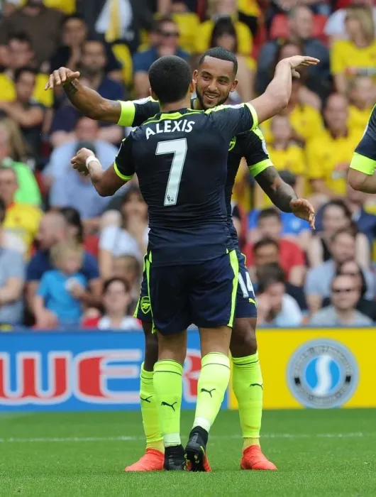 Framed Print : Arsenal's Unstoppable Duo: Sanchez and Walcott Celebrate Goals Against Watford (2016-17) Framed Print : Arsenal's Unstoppable Duo: Sanchez and Walcott Celebrate Goals Against Watford (2016-17)