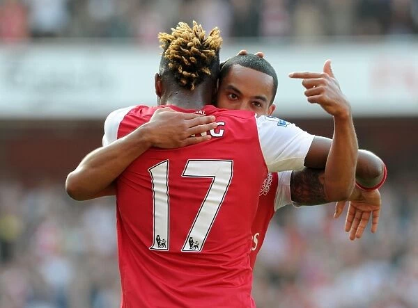 Arsenal's Unstoppable Duo: Theo Walcott and Alex Song's Triumphant 3-0 Victory Over Aston Villa