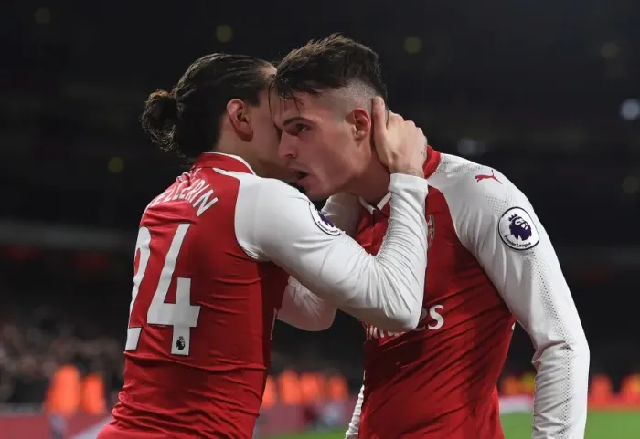 Framed Print : Arsenal's Unstoppable Duo: Xhaka and Bellerin's Goal Celebrations vs. Liverpool (2017-18)