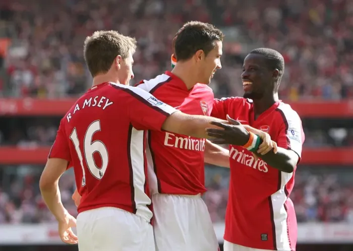 Framed Print : Arsenal's Unstoppable Force: Ramsey, van Persie, and Eboue Celebrate a 4-1 Victory Over Portsmouth