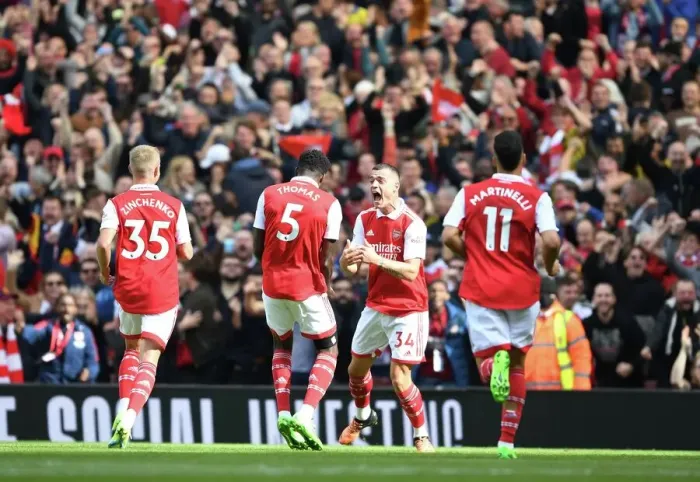 Framed Print : Arsenal's Unstoppable Midfield Duo: Thomas Partey and Granit Xhaka Score First Goals Against Tottenham (2022-23)