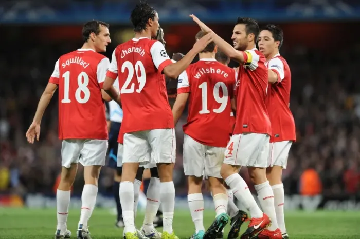 Framed Print : Arsenal's Unstoppable Onslaught: Chamakh's Hat-Trick Celebration with Wilshere, Fabregas, Nasri, Sagna, and Squillaci (6-0 vs. SC Braga, Champions League)