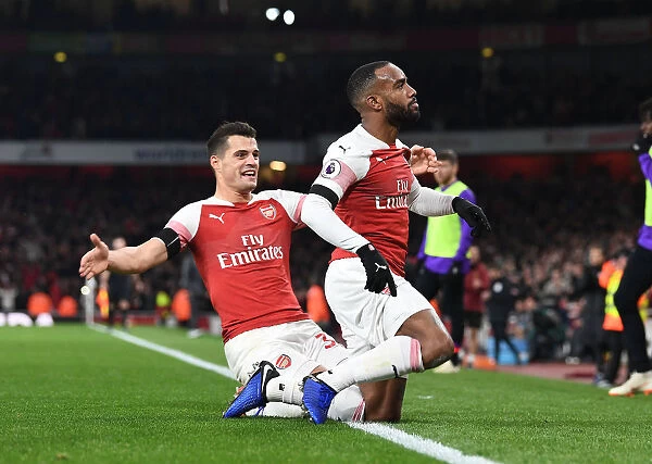 Arsenal's Unstoppable Partnership: Lacazette and Xhaka Celebrate Goal Against Liverpool, 2018-19 Premier League