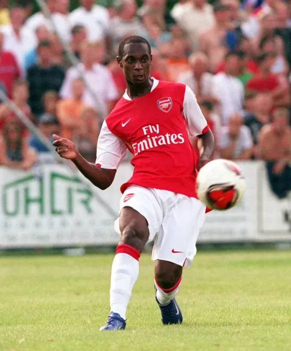 Framed Print : Arsenal's Unstoppable Pre-Season Performance: Justin Hoyte Shines in 8-1 Victory over Schwadorf, Austria, 2006