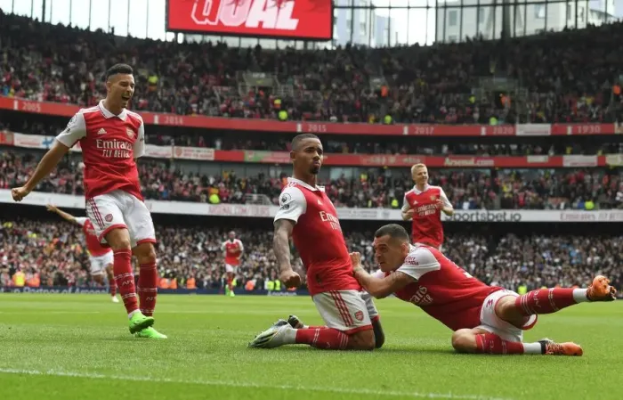 Framed Print : Arsenal's Unstoppable Trio: Jesus, Martinelli, and Xhaka's Goal Celebration in Arsenal's Triumph over Tottenham (2022-23 Premier League)