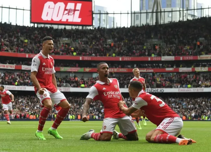 Framed Print : Arsenal's Unstoppable Trio: Jesus, Martinelli, and Xhaka Celebrate Double Strike Against Tottenham in the 2022-23 Premier League