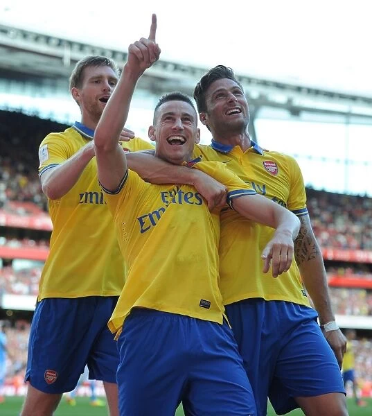 Arsenal's Unstoppable Trio: Koscielny, Mertesacker, and Giroud's Goal Celebrations (2013-14 Emirates Cup: Arsenal vs Napoli)
