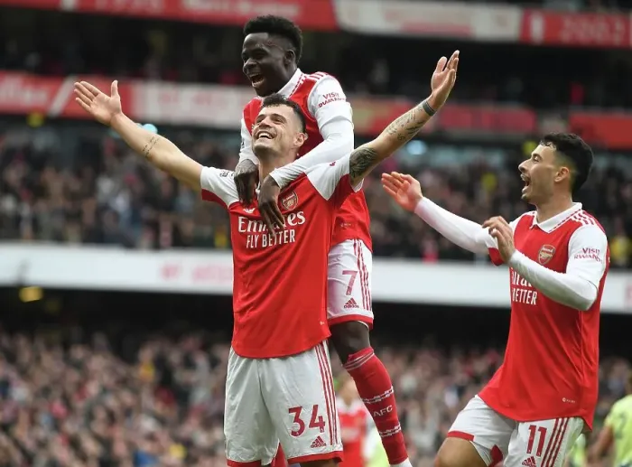 Framed Print : Arsenal's Unstoppable Triumph: Xhaka, Saka, and Martinelli's Euphoric Celebration (2022-23) Framed Print : Arsenal's Unstoppable Triumph: Xhaka, Saka, and Martinelli's Euphoric Celebration (2022-23)