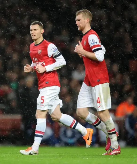 Framed Print : Arsenal's Vermaelen and Mertesacker in Action Against Chelsea (2013-14)